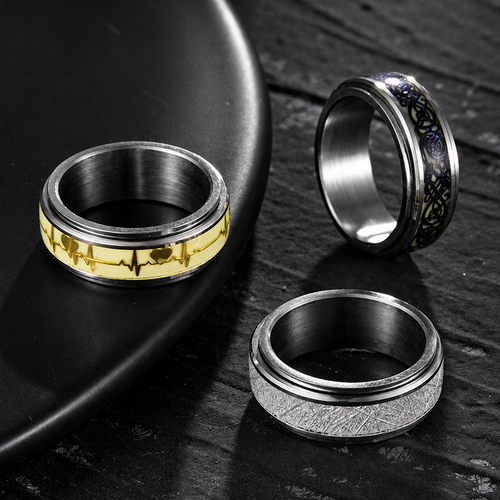 Bague anti-stress anneau tournant Fluo, anneau tournant jaune pâle orné d’une ligne de battement de cœur