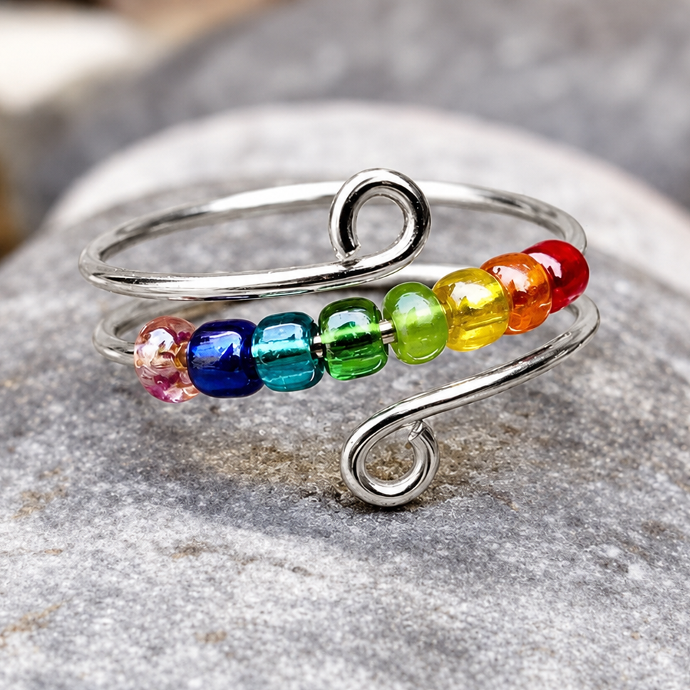 Bague anti-stress bille Arc-En-Ciel argentée, perles de verre arc-en-ciel sur double fil à spirales