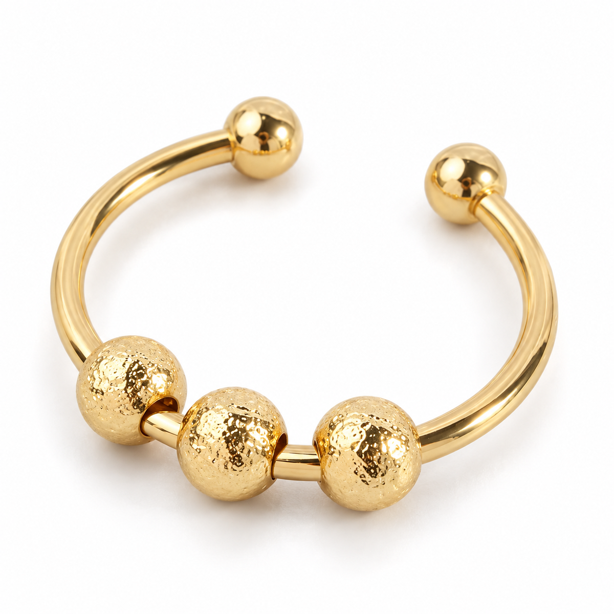 Bague anti-stress bille Grenue dorée, jonc ouvert à trois billes martelées, extrémités boules