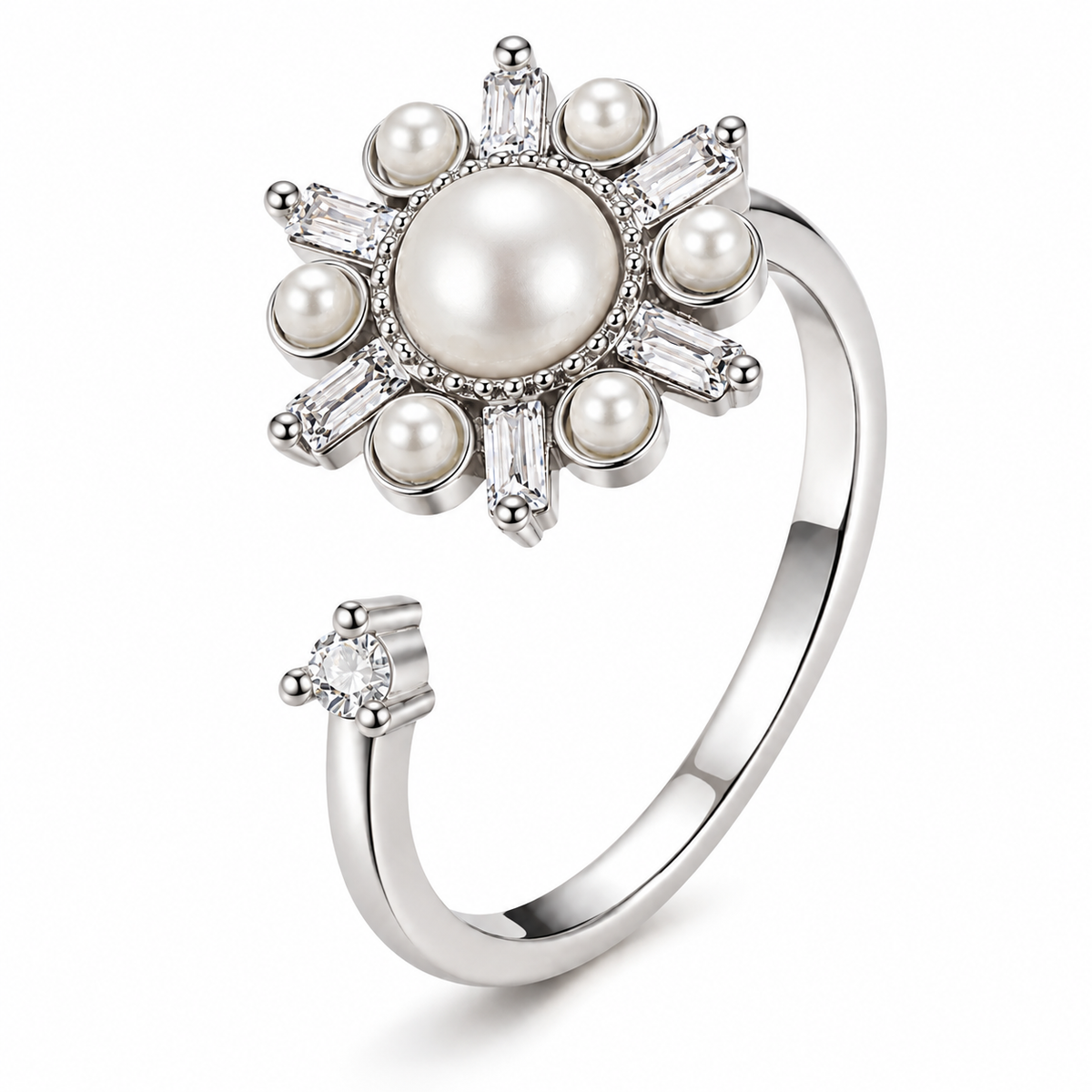 Bague anti-stress rotative Astre argentée, astre de perles blanches aux rayons de pierres taille baguette