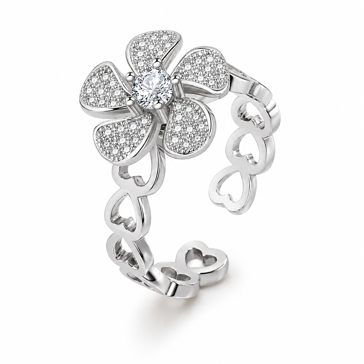 Bague anti-stress rotative Cercle d'Amour argentée, fleur pavée sur un anneau de cœurs ajourés