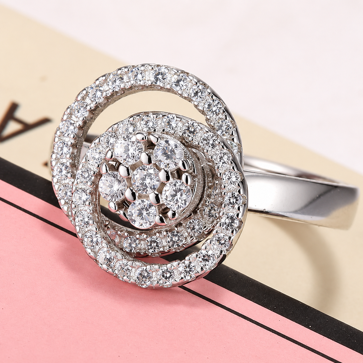Bague anti-stress rotative Charme, spirale pavée autour d’un bouquet de pierres