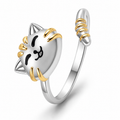 Bague anti-stress rotative Chat Mignon, tête de chat argentée aux détails dorés, queue enroulée