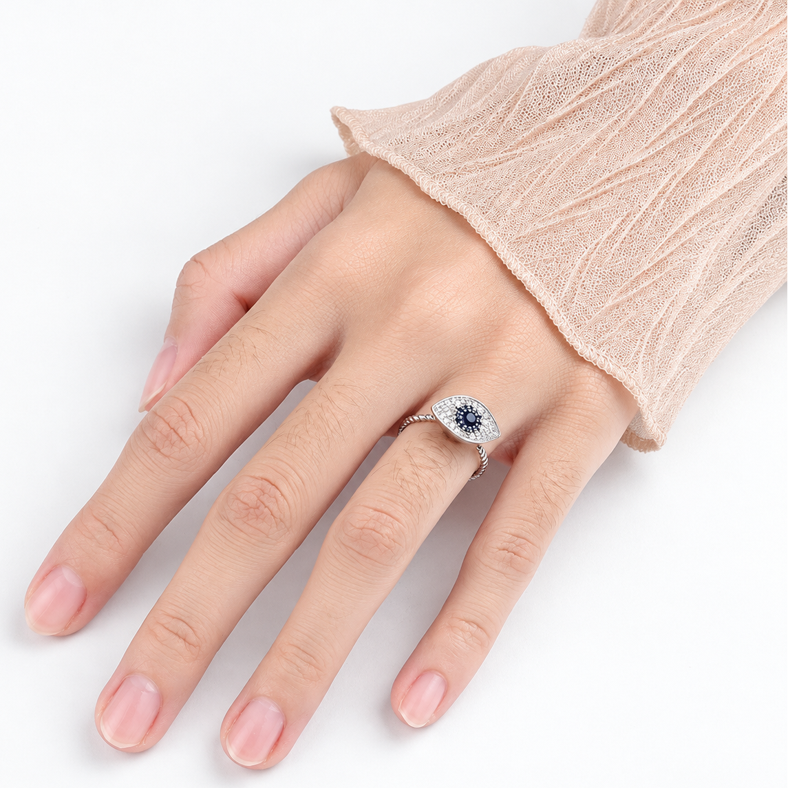 Bague anti-stress rotative Cyclope, œil pavé à iris de pierres bleu nuit, anneau torsadé, portée au doigt