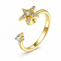 Bague anti-stress rotative Étoile dorée, étoile pavée de petites pierres et pierre centrale