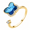 Bague anti-stress rotative Papillon Galactique dorée, papillon en cristal bleu facetté bordé de petites pierres