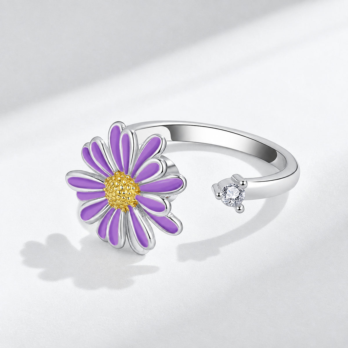 Bague anti-stress rotative Pâquerette argentée, pâquerette émaillée blanche au cœur doré texturé