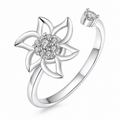 Bague anti-stress rotative Pétale Tranchante, fleur ajourée aux pétales effilés, cœur pavé