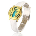 Bracelet diffuseur huile essentielle cuir blanc Angel, médaillon ailes d’ange ajourées sur bracelet en cuir blanc