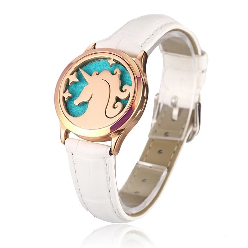 Bracelet diffuseur huile essentielle cuir blanc Licorne rose gold, médaillon tête de licorne et étoiles sur bracelet en cuir blanc