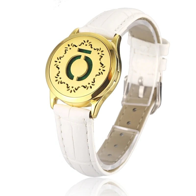 Bracelet diffuseur huile essentielle cuir blanc Xera doré, médaillon cercle stylisé et feuillage sur bracelet en cuir blanc
