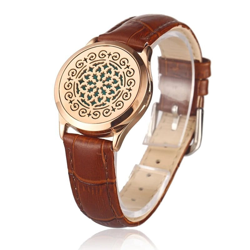 Bracelet diffuseur huile essentielle cuir marron Voxa rose gold, médaillon rosace de volutes et d’étoiles sur bracelet en cuir marron