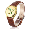 Bracelet diffuseur huile essentielle cuir marron YL doré, médaillon monogramme YL et feuille sur bracelet en cuir marron