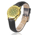 Bracelet diffuseur huile essentielle cuir noir Voxa, médaillon doré rosace de volutes et d’étoiles sur bracelet en cuir noir
