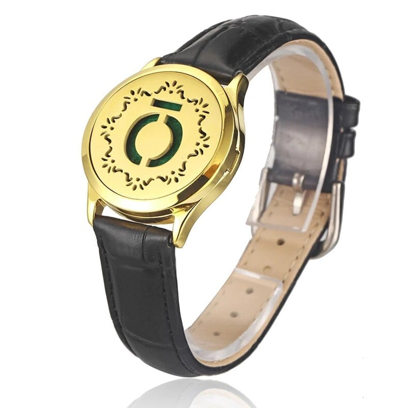 Bracelet diffuseur huile essentielle cuir noir Xera doré, médaillon cercle stylisé et feuillage sur bracelet en cuir noir