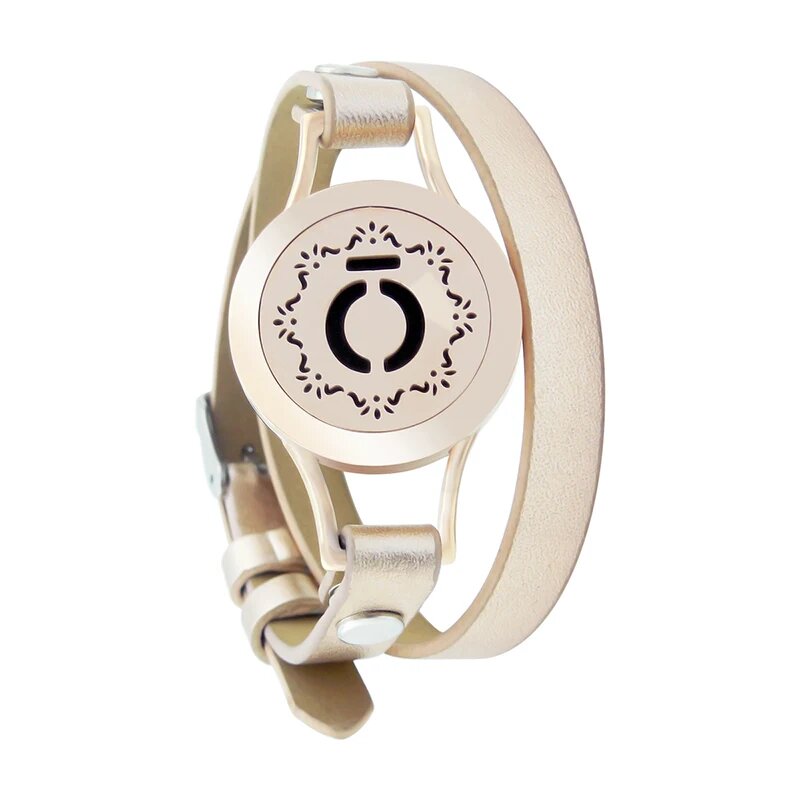 Bracelet diffuseur huile essentielle Xera rose gold, médaillon cercle stylisé et couronne de feuillage sur double tour de cuir