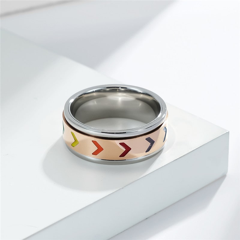 Bague anti-stress anneau tournant Boost dorée, anneau tournant orné de chevrons multicolores